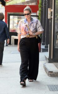 Georgina Burke in a Floral Blouse