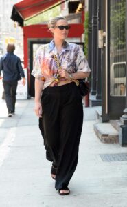 Georgina Burke in a Floral Blouse