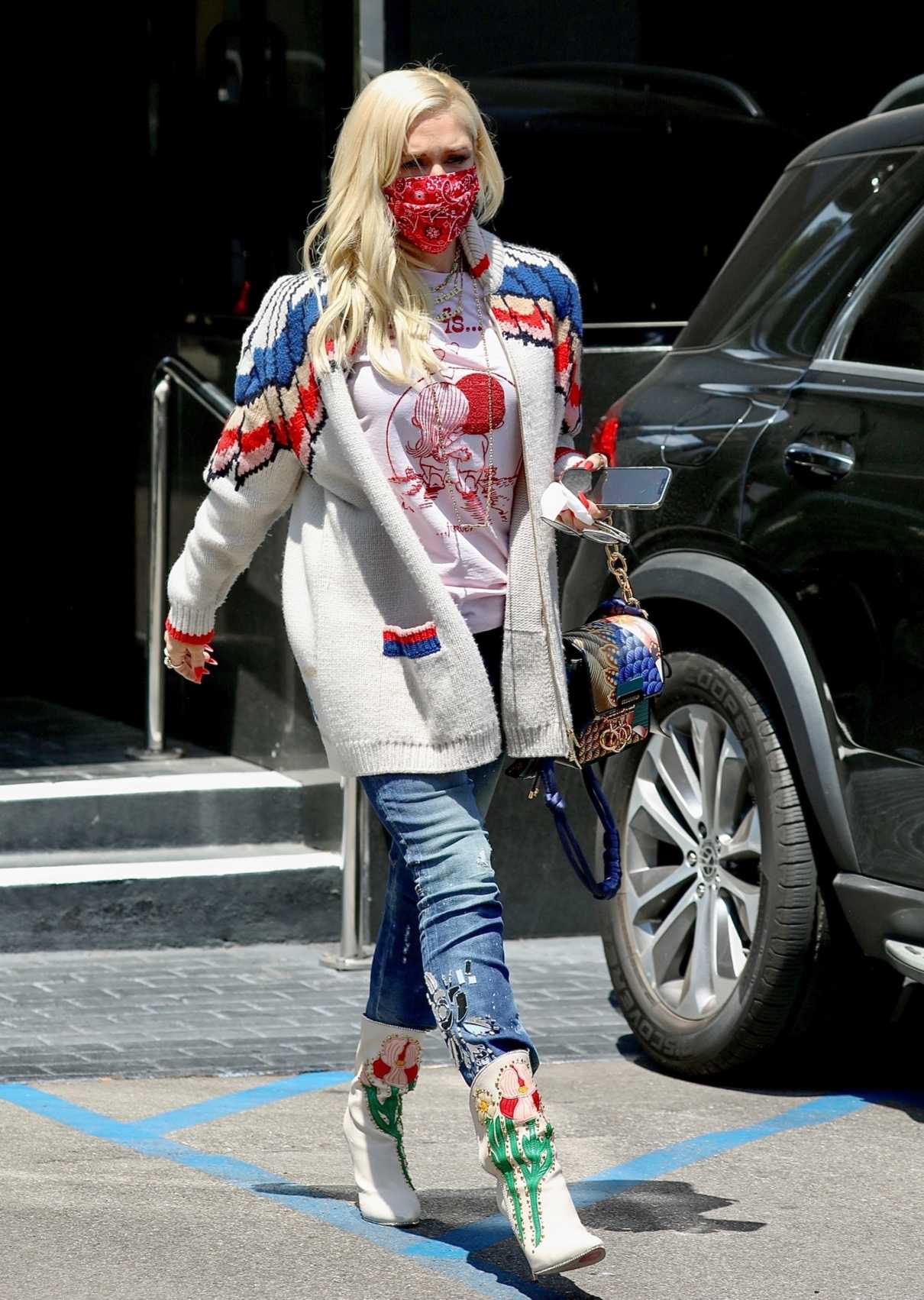 Gwen Stefani in a Red Protective Mask