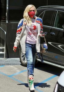 Gwen Stefani in a Red Protective Mask