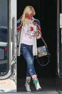 Gwen Stefani in a Red Protective Mask