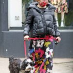 Helena Bonham Carter in a Black Puffer Jacket Was Seen Out for a Dog Walk with Her Boyfriend Rye Dag Holmboe in London 05/18/2021