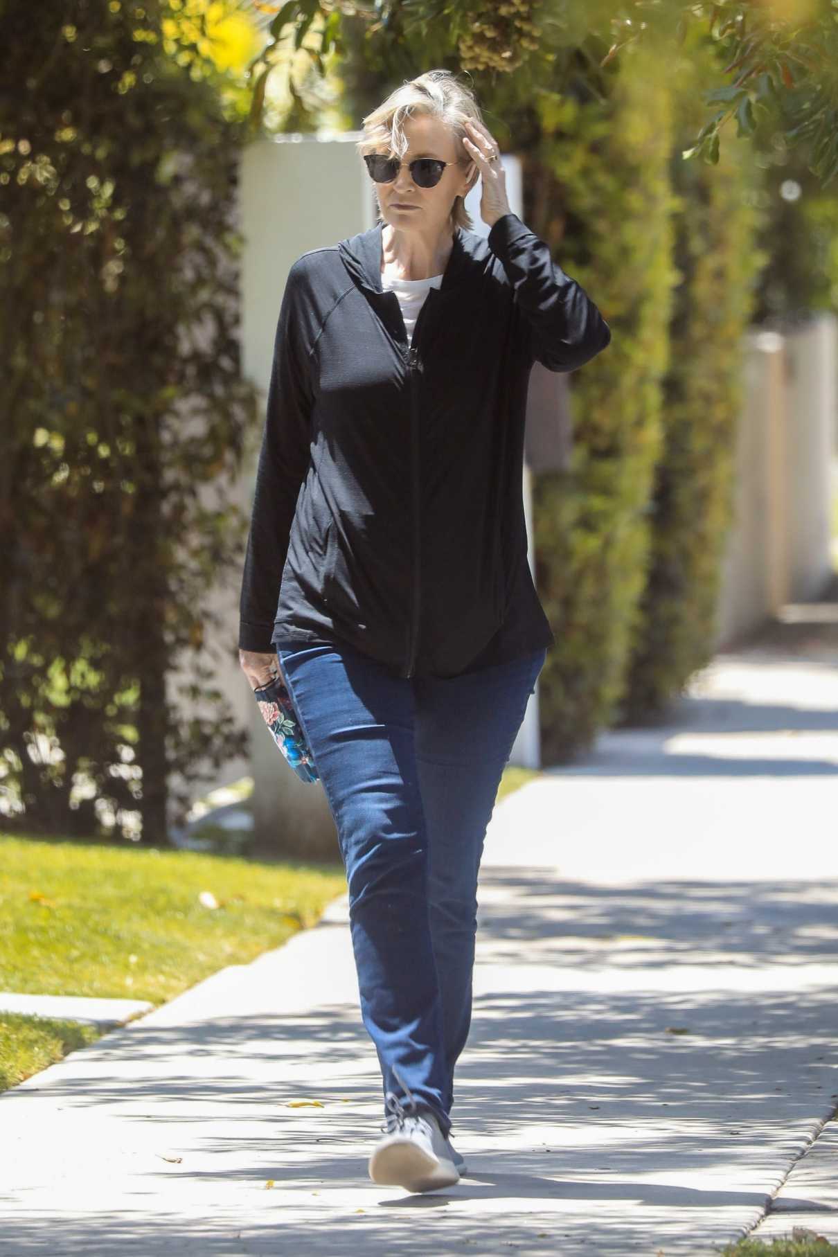Jane Lynch in a Black Track Jacket
