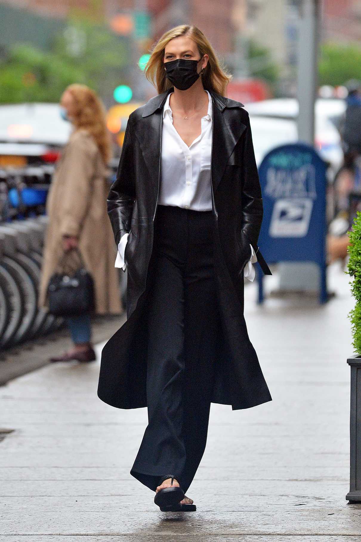 Karlie Kloss in a Black Leather Coat