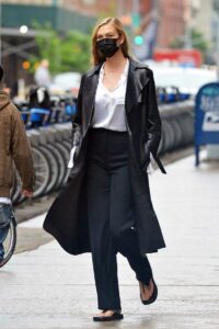 Karlie Kloss in a Black Leather Coat