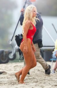 Lily James in a Red Swimsuit