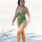 Malin Andersson in a Green Swimsuit on the Beach in Palma 05/09/2021