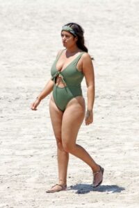 Malin Andersson in a Green Swimsuit