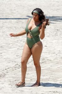 Malin Andersson in a Green Swimsuit