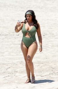 Malin Andersson in a Green Swimsuit