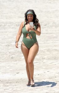 Malin Andersson in a Green Swimsuit