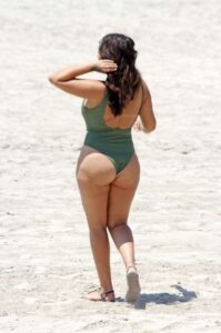 Malin Andersson in a Green Swimsuit