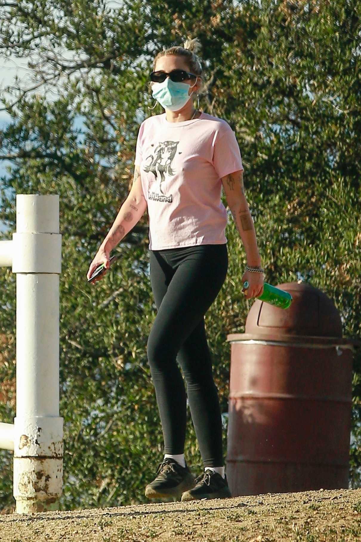 Miley Cyrus in a Pink Tee