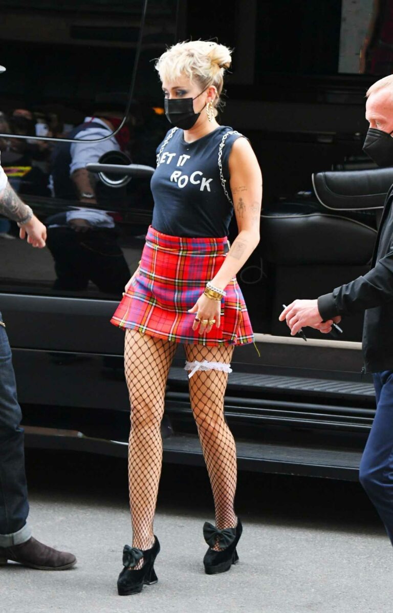 Miley Cyrus in a Red Plaid Mini Skirt Returns to Her Hotel After ...