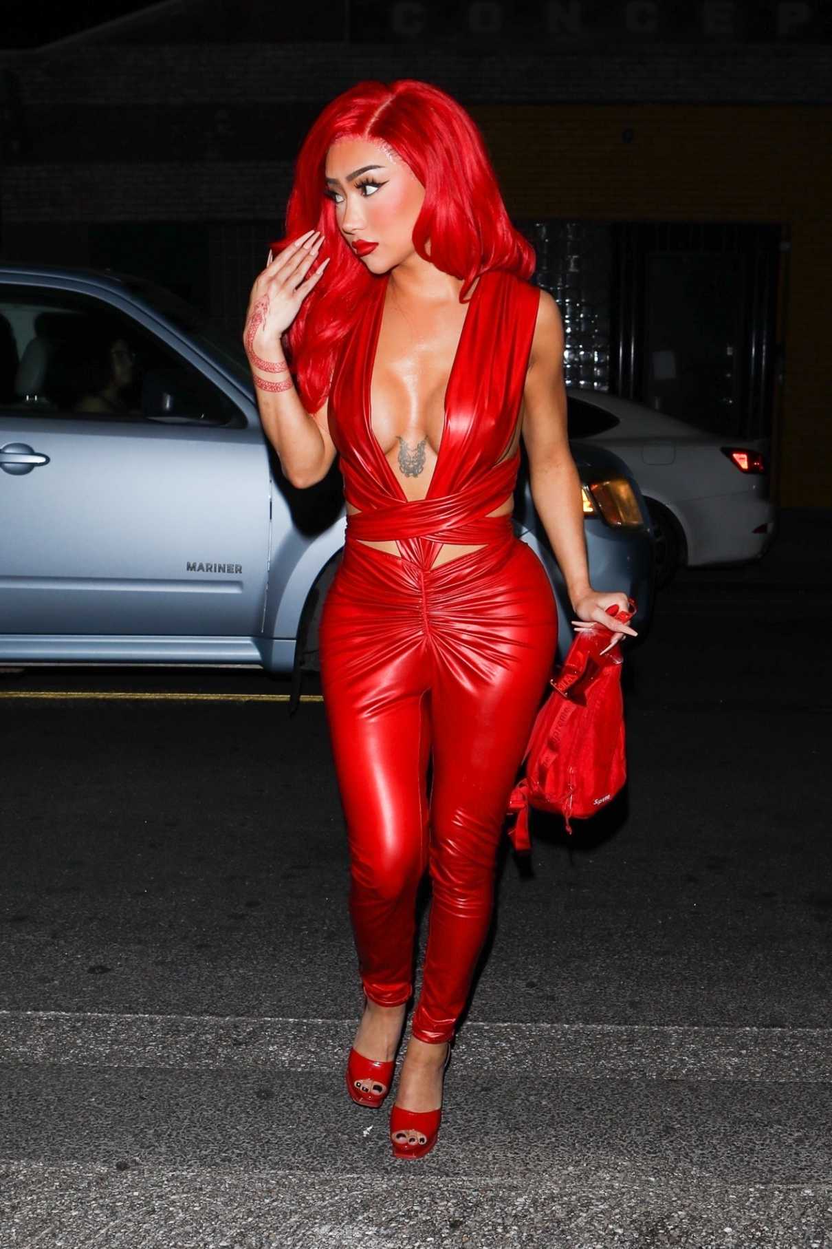 Nikita Dragun in a Red Leather Jumpsuit