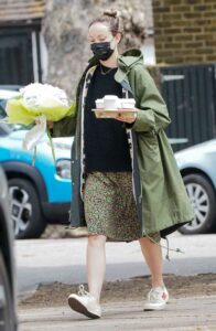 Olivia Wilde in an Olive Windbreaker