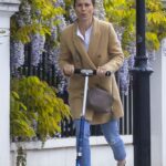 Pippa Middleton in a Beige Coat Enjoys a Scooter Ride on the Streets of London 05/21/2021