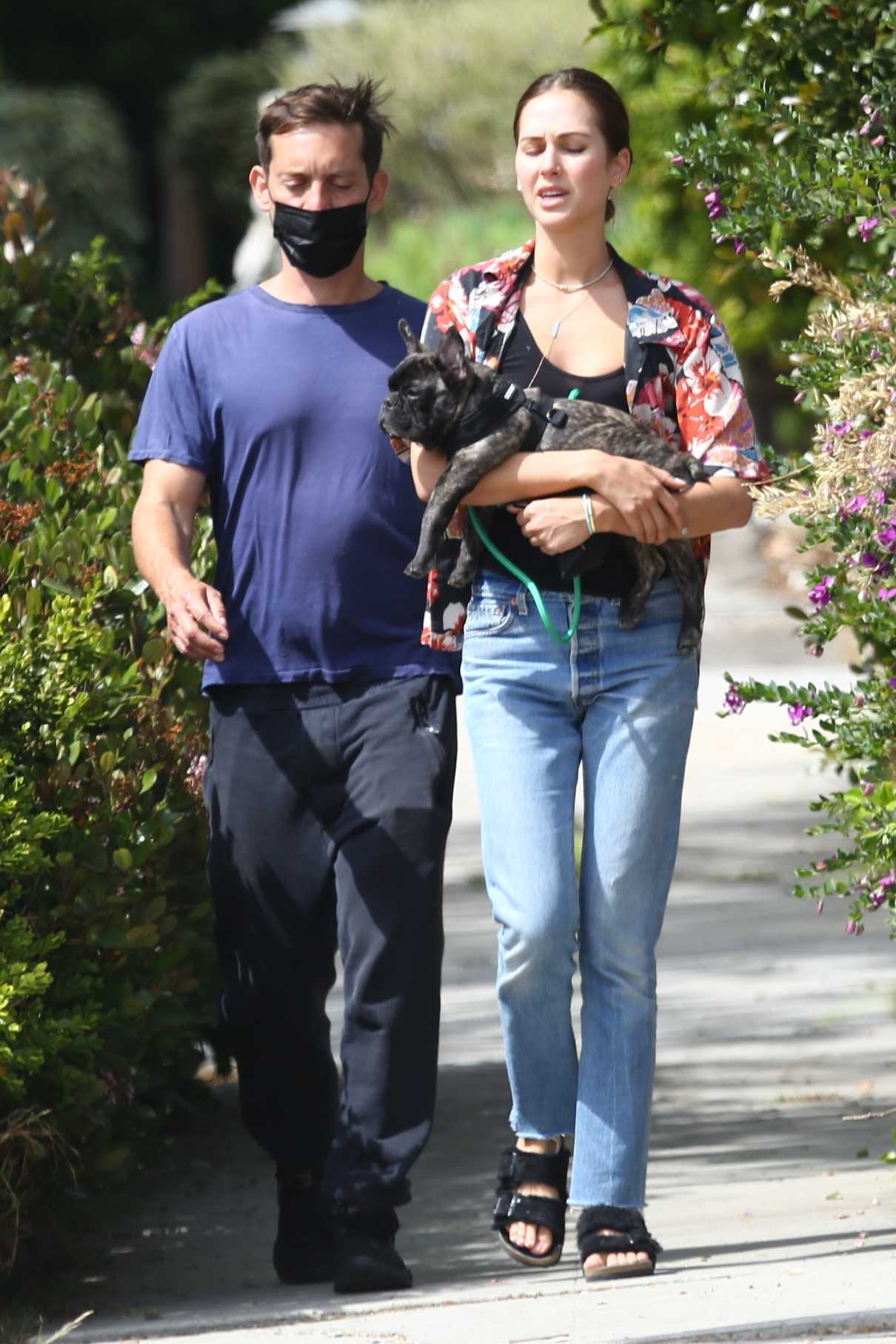 Tatiana Dieteman in a Floral Blouse Walks Her Dog Out with Tobey ...