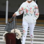 Vivica A. Fox in a Black Cap Arrives at LAX Airport in Los Angeles 05/10/2021