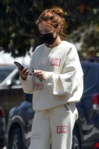 Zoey Deutch in a White Sweatsuit
