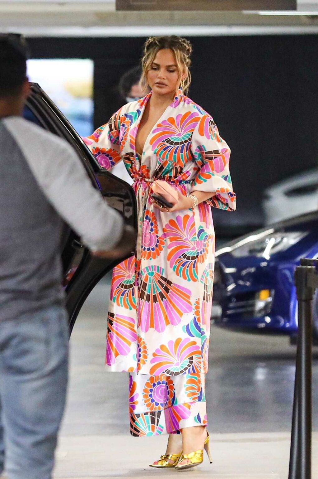 Chrissy Teigen in a Floral Cardigan Steps Out for Lunch at Soho House