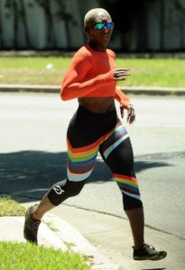 Cynthia Erivo in an Orange Top