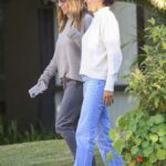 Elsa Pataky in a Grey Sweater Was Seen Out with Luciana Barosso at the Roadhouse Cafe in Byron Bay 06/21/2021
