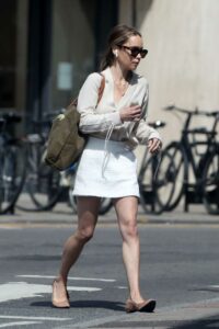 Emilia Clarke in a White Mini Skirt