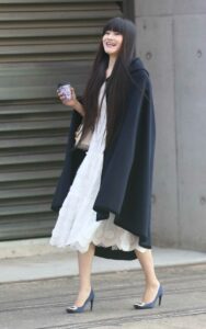 Icy Ling in a Black Cardigan