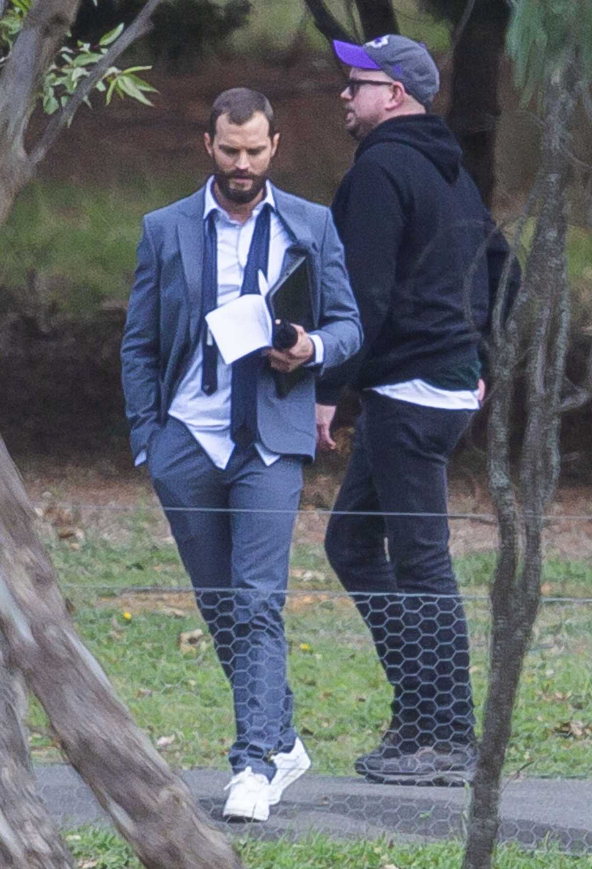 Jamie Dornan in a White Sneakers