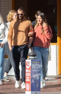 Jamie Dornan in an Orange Hoodie