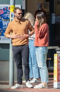 Jamie Dornan in an Orange Hoodie