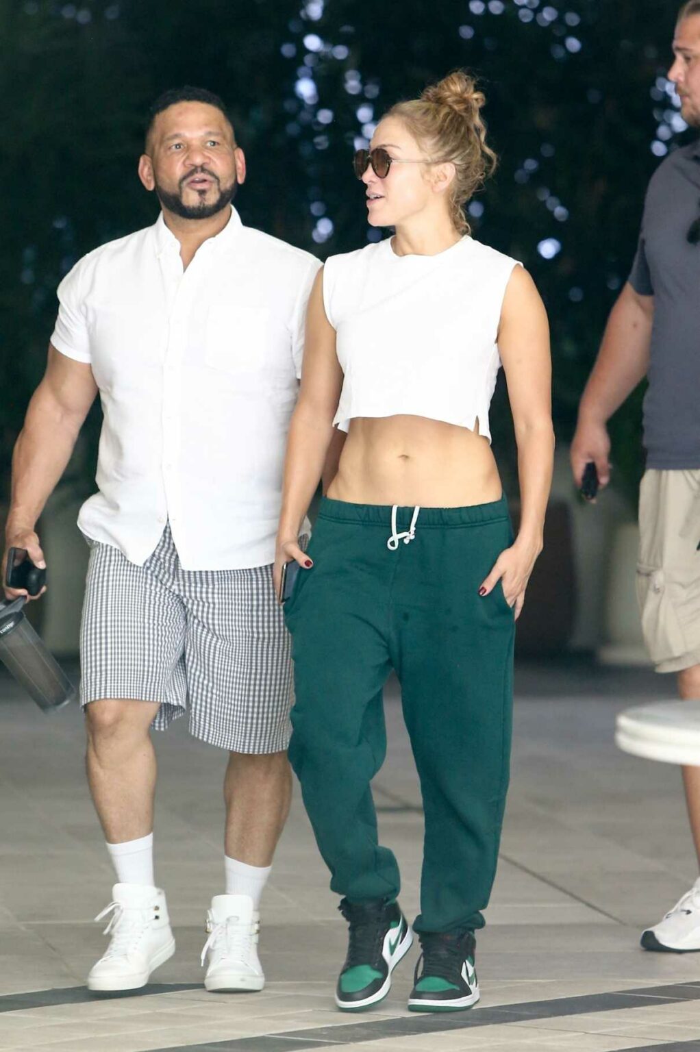 Jennifer Lopez in a White Top Was Seen Out with Her Manager Benny