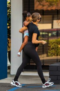 Khloe Kardashian in a Black Tee