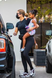 Khloe Kardashian in a Black Tee