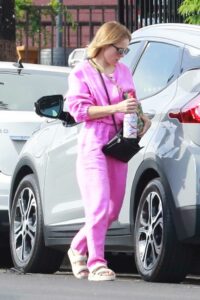 Kristen Bell in a Purple Jumpsuit