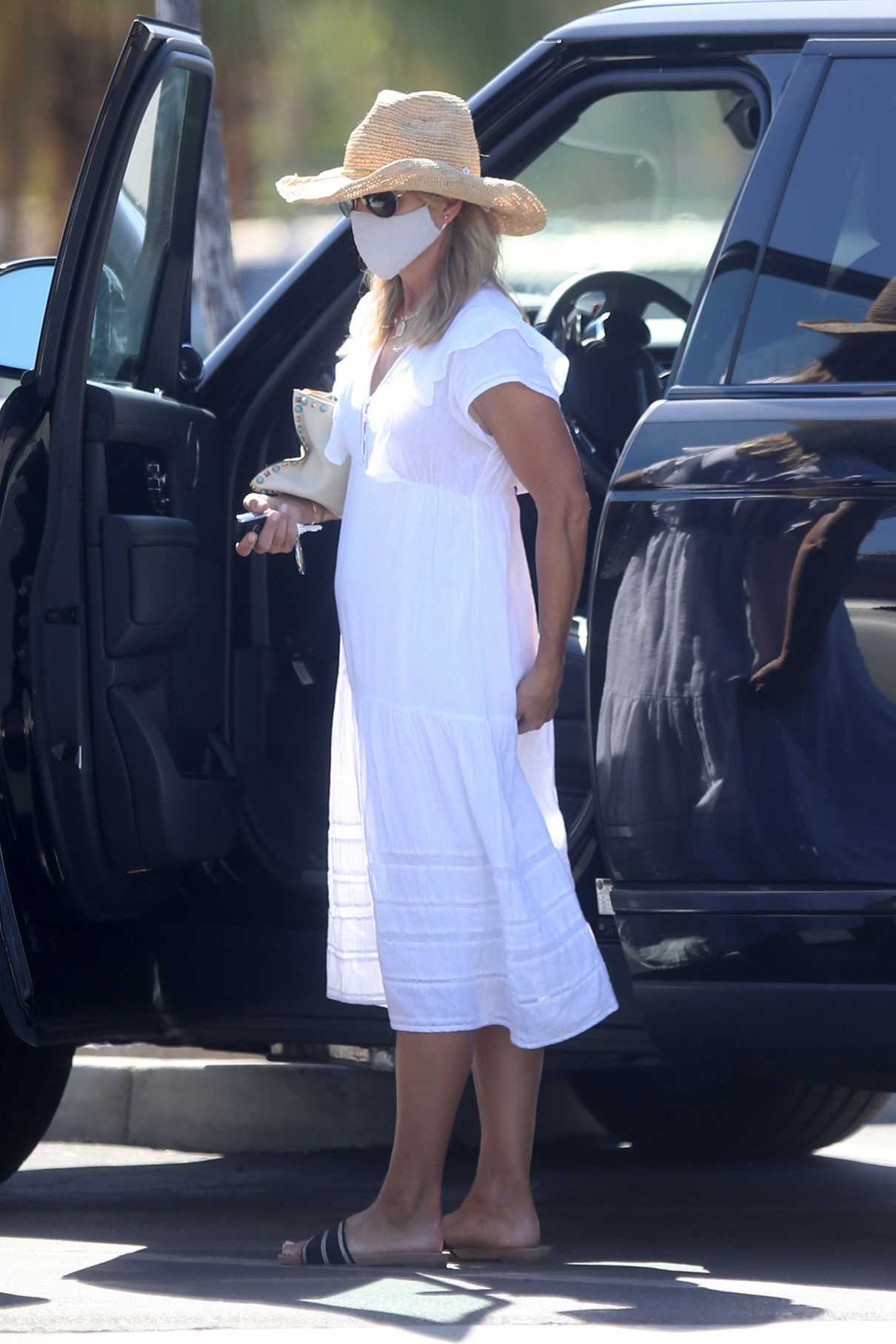 Lori Loughlin in a White Dress