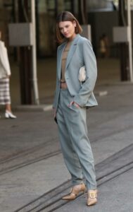 Montana Cox in a Grey Pantsuit