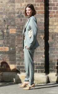 Montana Cox in a Grey Pantsuit