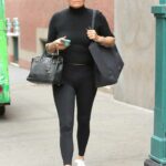 Yolanda Hadid in a Black Cap Walks Out Her Granddaughter in New York City 06/03/2021