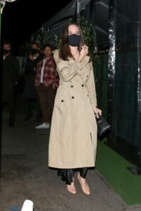 Angelina Jolie in a Beige Trench Coat