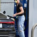 Charlize Theron in a Blue Ripped Jeans Stops to Fill Up Her Tank in West Hollywood 07/24/2021