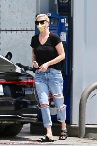 Charlize Theron in a Blue Ripped Jeans