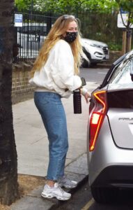 Clara Paget in a White Bomber Jacket