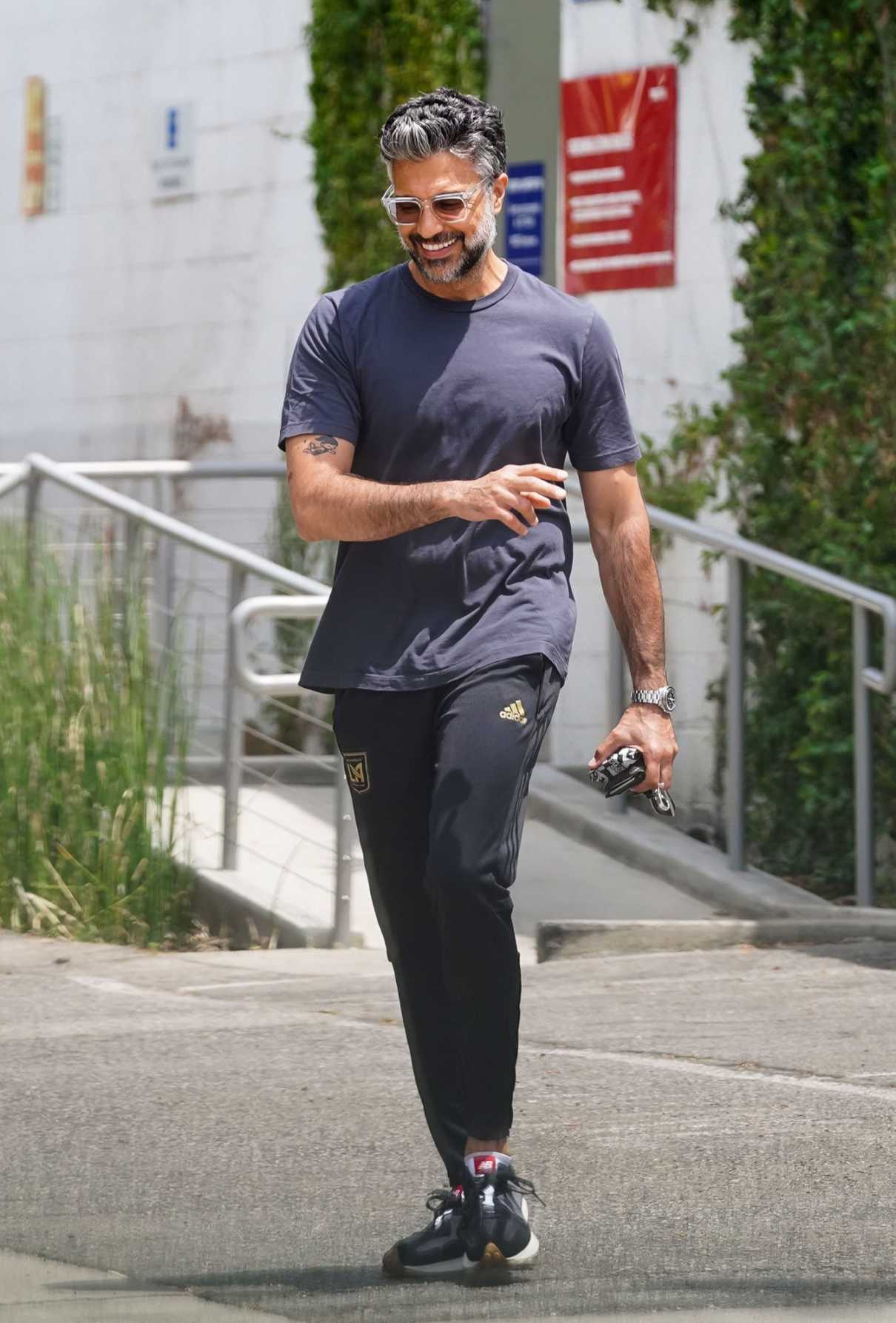 Jaime Camil in a Black Track Pants