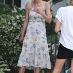 Jaime King in a White Floral Sundress Enjoys a Quick Break while Filming a New Project in Los Angeles 07/02/2021