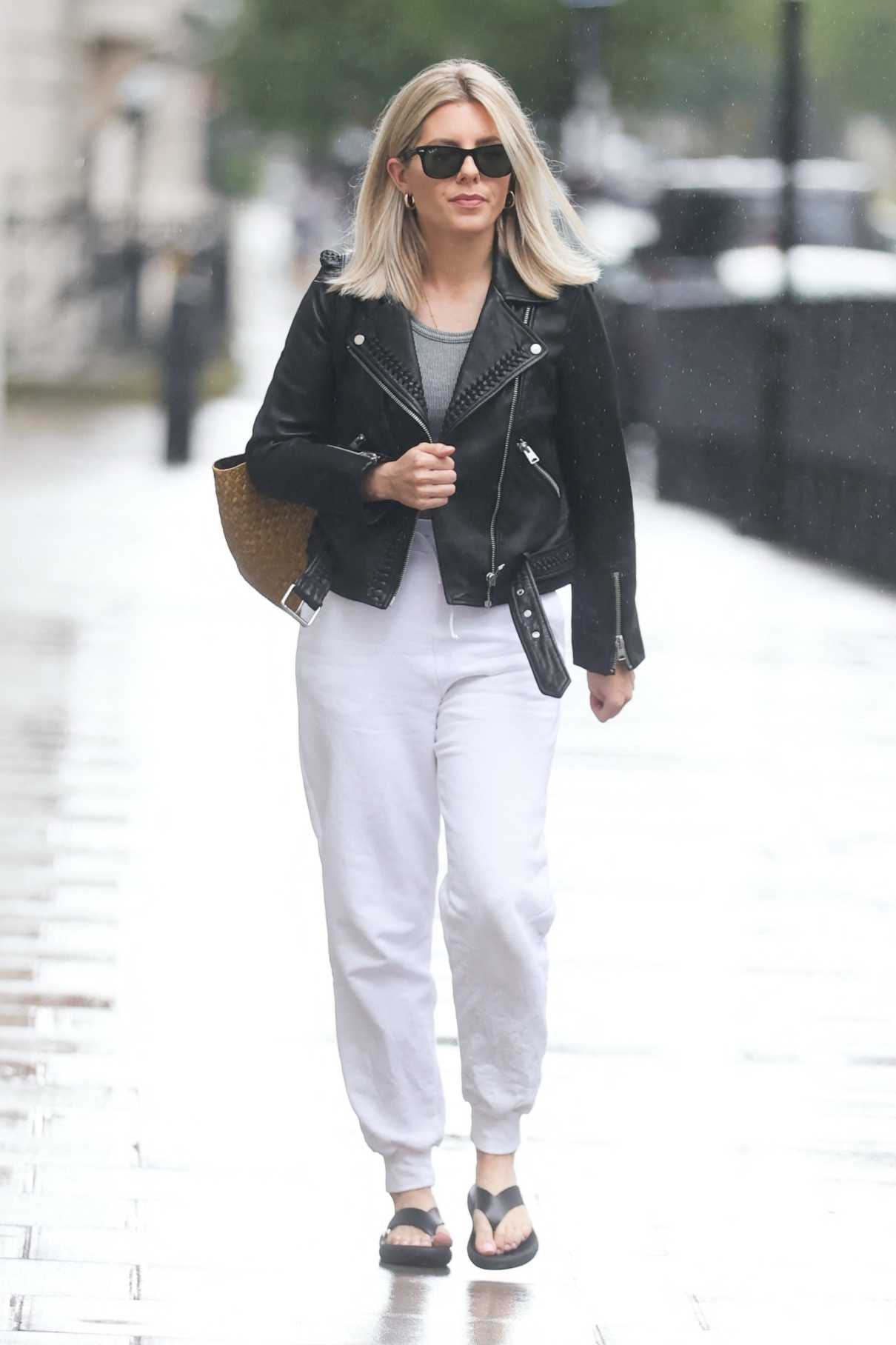 Mollie King in a White Sweatpants