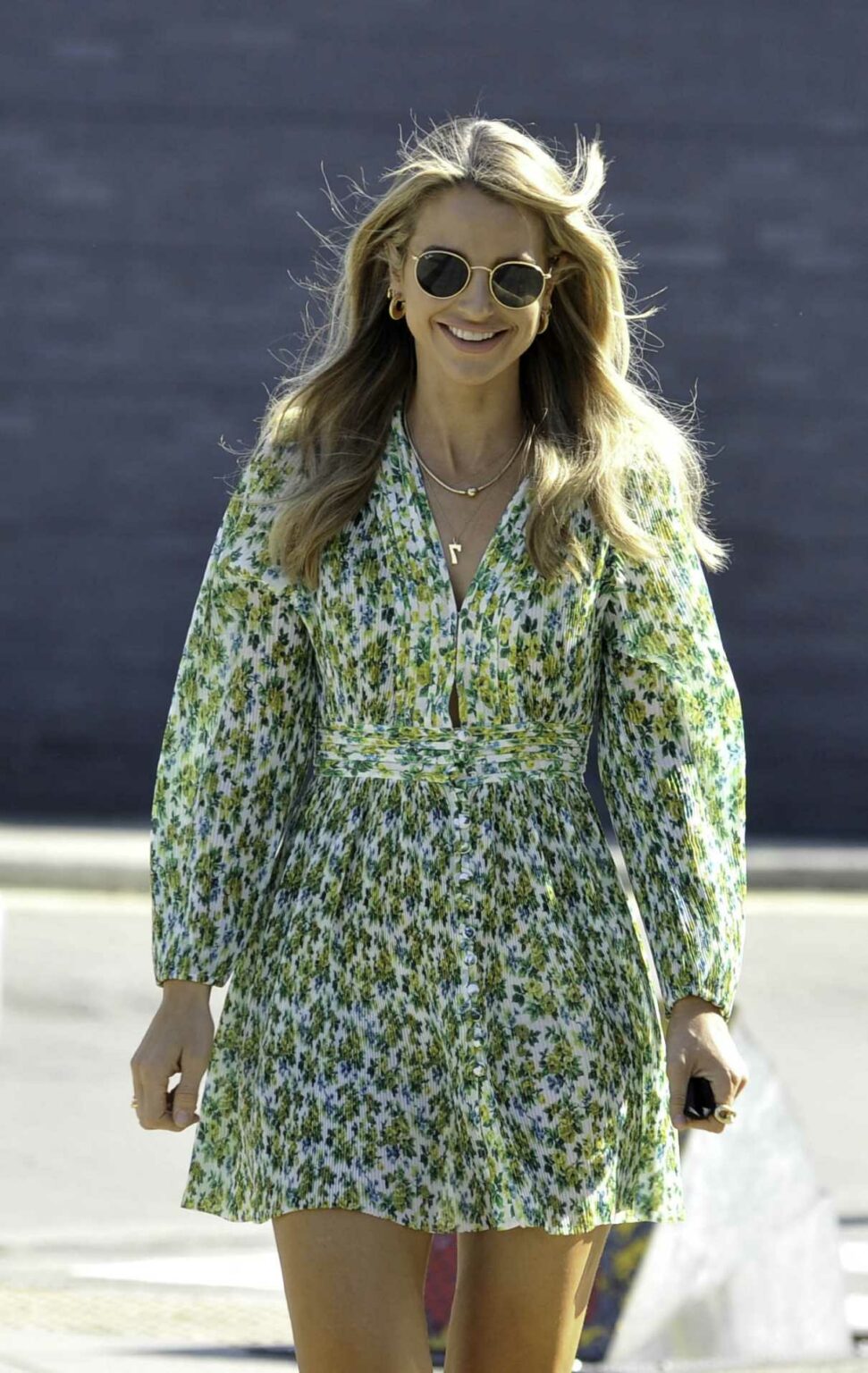 Vogue Williams in a Green Floral Mini Dress Arrives at Steph’s Packed