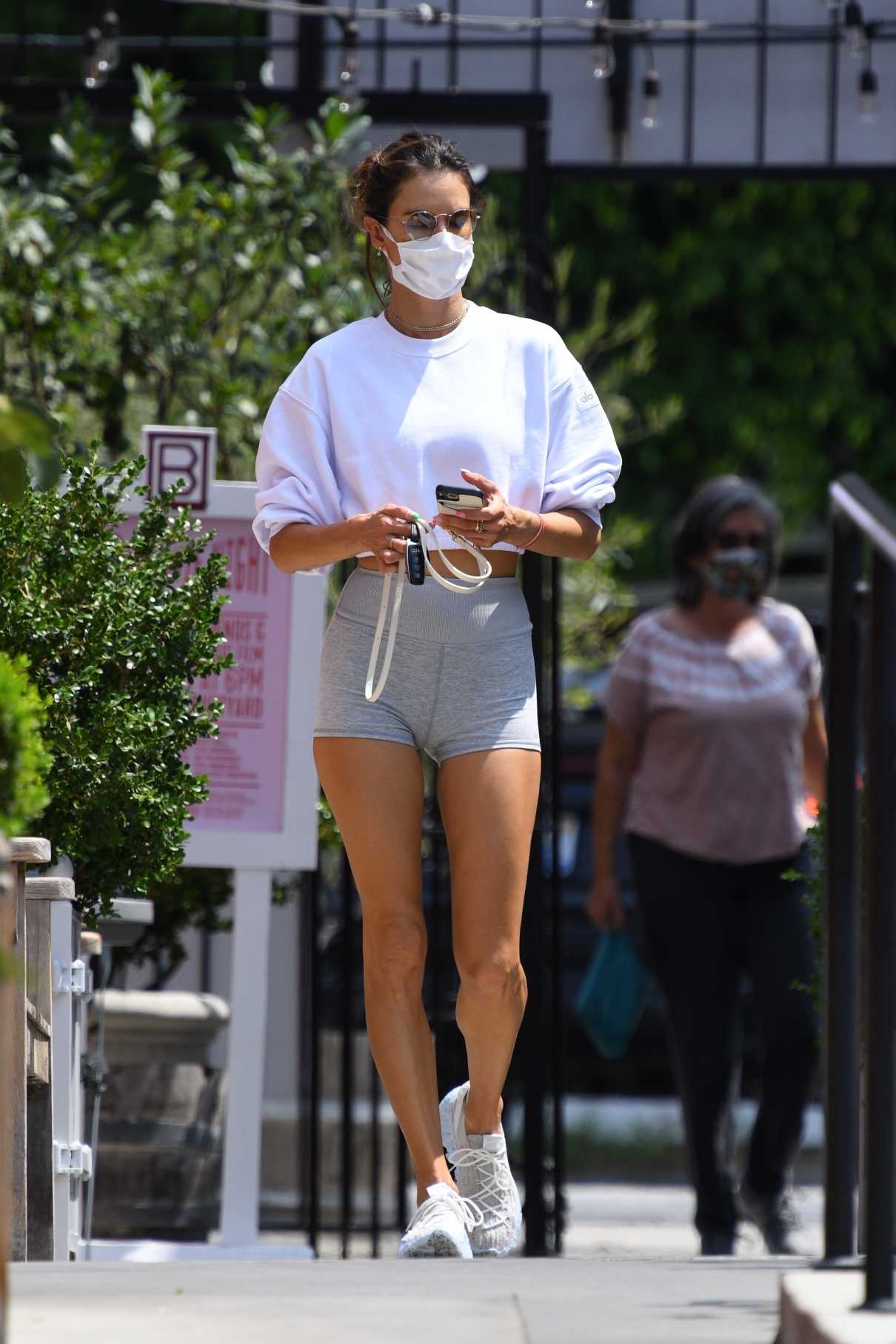 Alessandra Ambrosio in a Grey Spandex Shorts