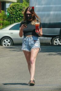 Ashley Benson in a Blue Denim Shorts